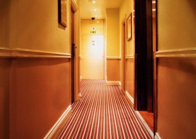 hotel carpeted hallway